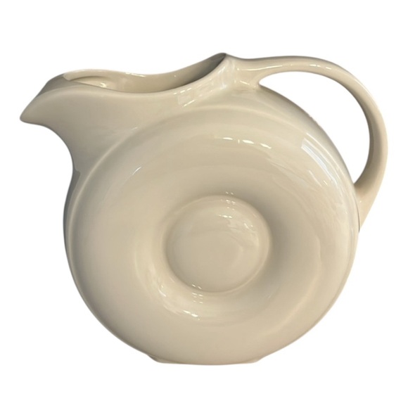 Hall Vintage MCM off-white donut pitcher #1335 is a...